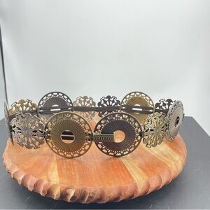 Sandy: EU brand, Stretch Concho hip Belt, size small. Metal medallion Lagenlook